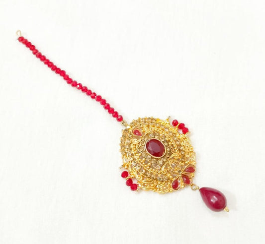 Golden Polish Bindiya with Red Gemstone Centerpiece