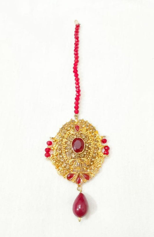 Golden Polish Bindiya with Red Gemstone Centerpiece